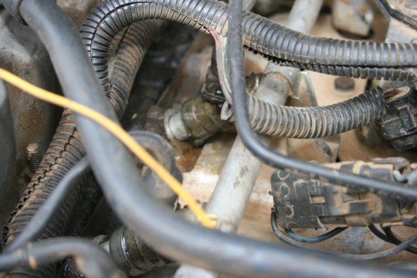 a leaky fuel injector that's not fully seated