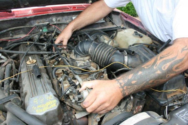 removing the fuel rail from a jeep 4.0L engine