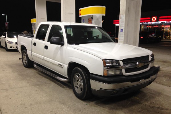 chevy silverado at a gas station