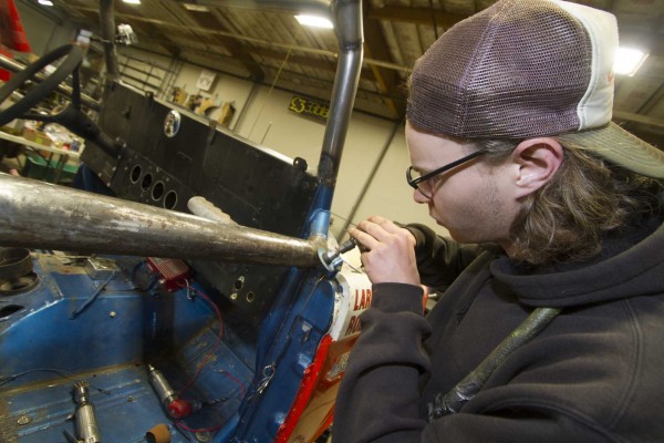 ban grinding roll cage weld on ford bronco race truck