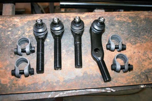 steering and suspension parts on a workbench