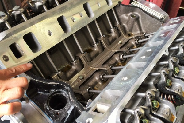 edge of cylinder head along lifter valley