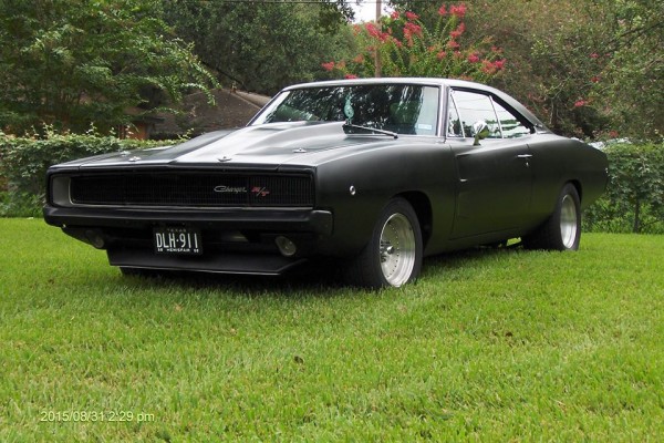 black 1968 dodge charger restomod, front