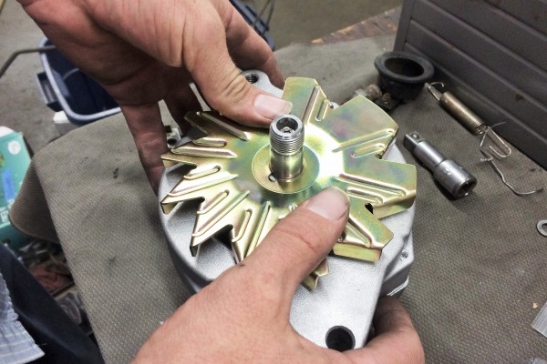 disassembling alternator on workbench