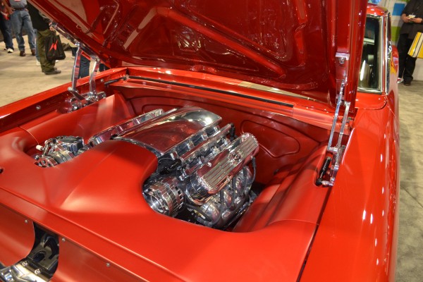 engine bay of a Pontiac Acadian show car at SEMA 2015