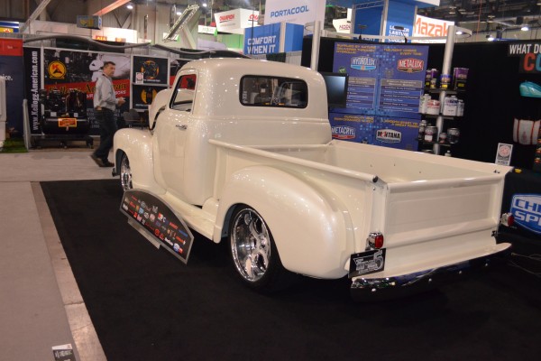 white chevy 3100 truck on display at SEMA 2015, rear quarter