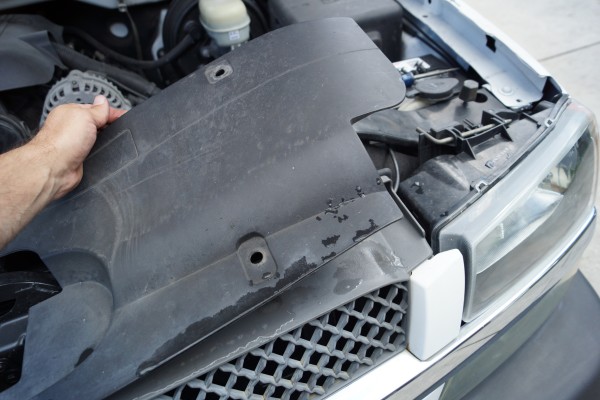 removing plastic shroud on a chevy silverado to change headlight bulb