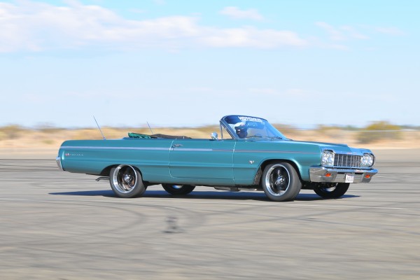 classic chevy impala in a tight turn