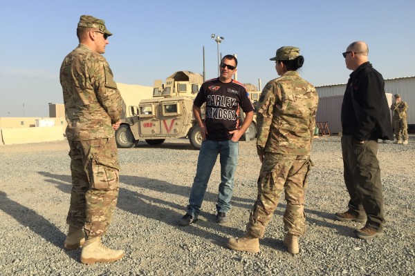 Eddie Krawiec making new friends at Camp Arifjan.