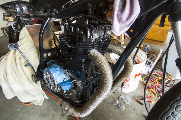 motorcycle engine with wrapped header exhaust pipes