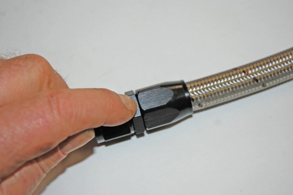 close up of the end of an AN hose with fitting