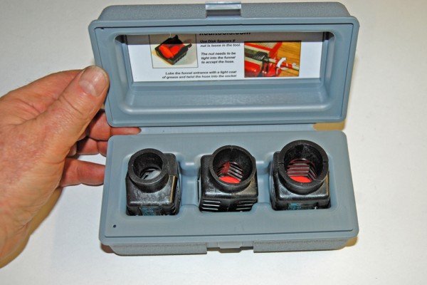 a box containing hose fitting dies
