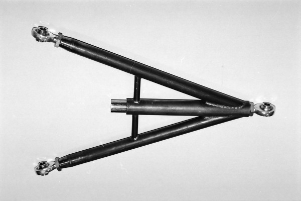 wishbone track locator for a race car
