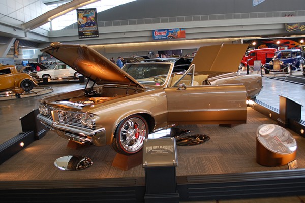 1960s customized pontiac convertible at car show