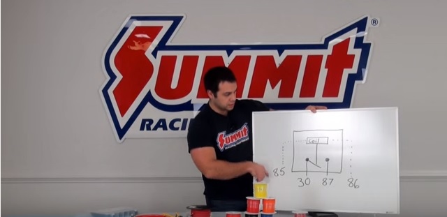 man explaining how electric relays work
