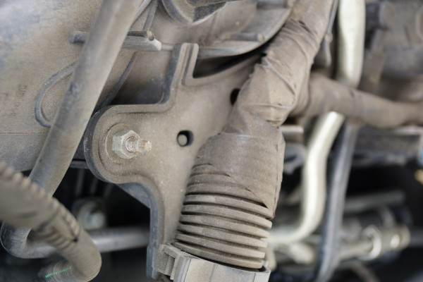clip holding wiring harness on an engine