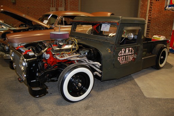 willys jeep rat rod at indoor car show