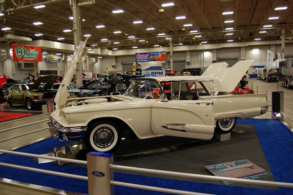 white ford thunderbird coupe at indoor car show