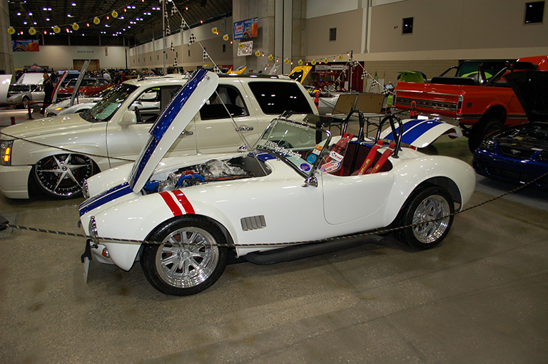 white, red, and blue shelby cobra kit car