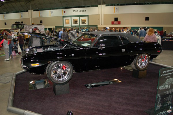 custom dodge challenger first gen at indoor car show