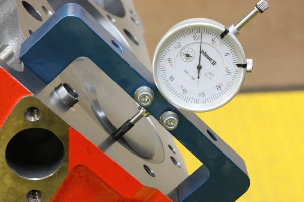 checking deck height on an engine with a dial gauge