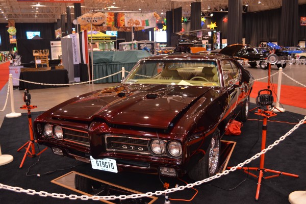 second gen pontiac gto at indoor car show