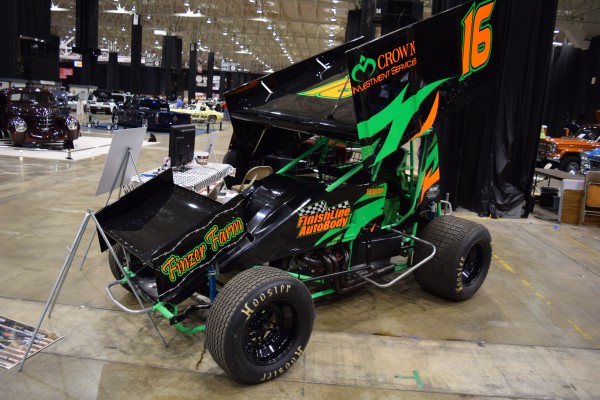 winged sprint car vintage on display at indoor car show