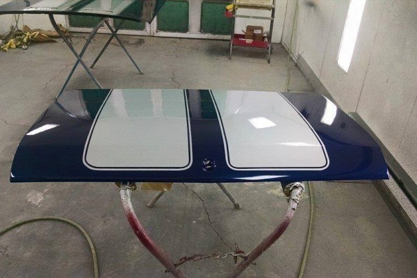 blue 1968 chevelle trunk lid getting painted