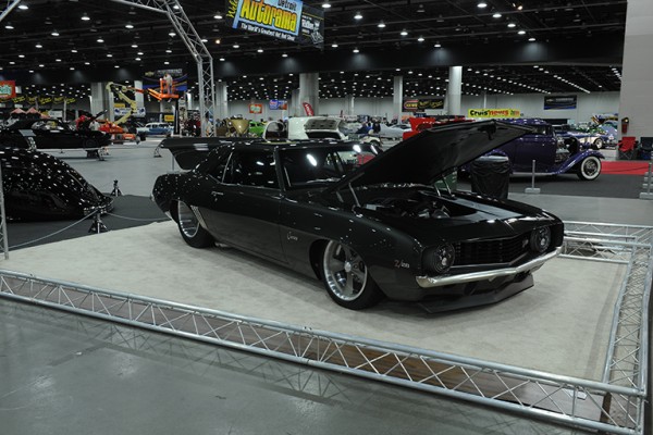 customized 1969 chevy camaro at indoor car show