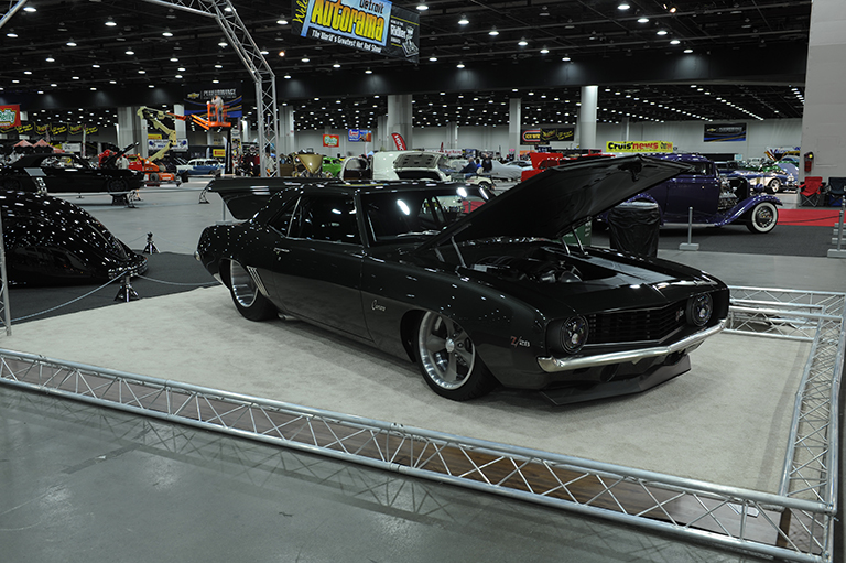 customized 1969 chevy camaro at indoor car show
