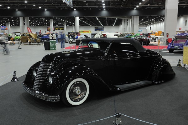 custom lowrider hotrod roadster at indoor car show