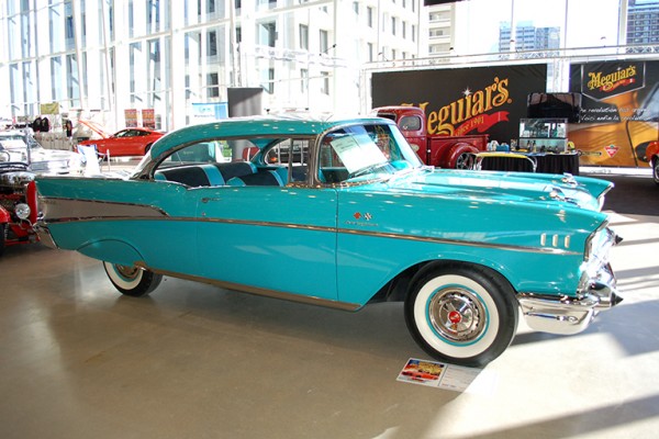 aqua 1957 chevy bel air coupe at indoor car show