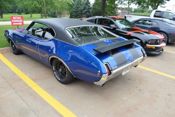 Oldsmobile cutlass 442 parked at summit racing