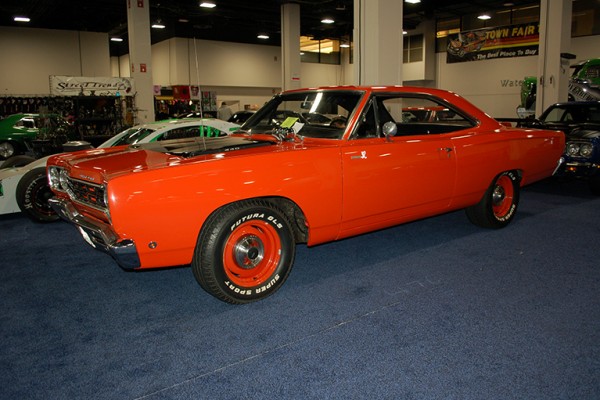 orange plymouth road runner at car show