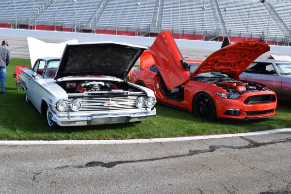 row of cars at a car show