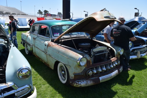 old patina'd car at a show
