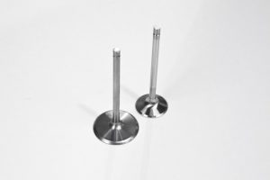 The stock Del West titanium intake valve and sodium-filled exhaust valves are so light and durable that SAM Tech saw no reason to replace them. They check in at 2.025/1.615 inches, which is the max allowed by NHRA rules. 