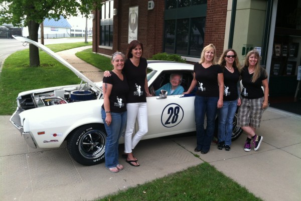 women pose with AMC AMX for project Valkyrie