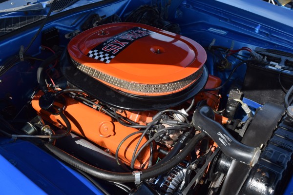 440 magnum six pack engine in a mopar muscle car