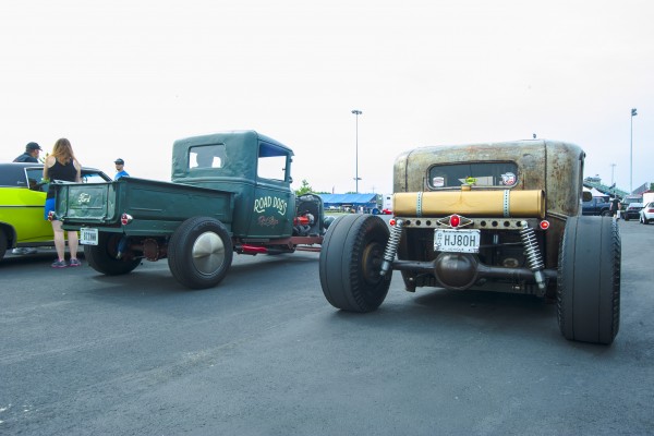 pair of hotrods at a classic car show