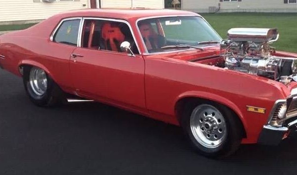 quarter shot of a chevy nova supercharged drag car