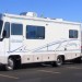 jeep wrangler being towed behind an rv camper thumbnail
