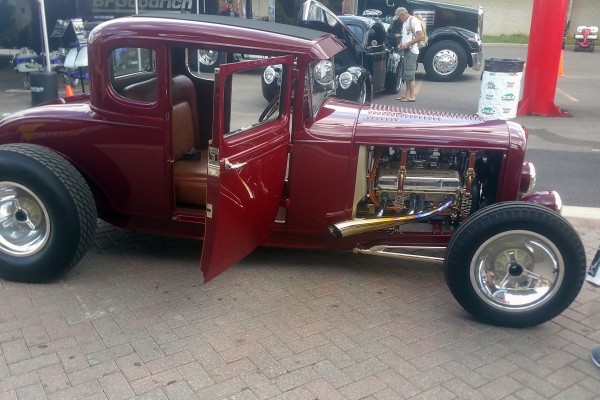 side view of a ford hotrod coupe with v8