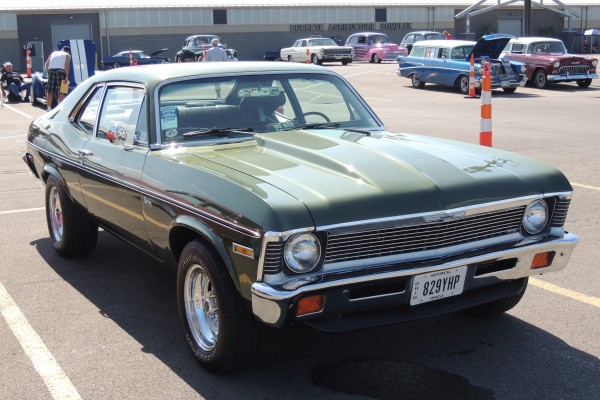 chevy nova muscle car with custom wheels