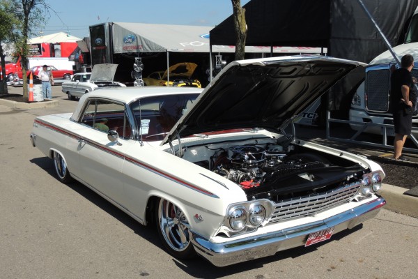 white chevy impala lowrider coupe