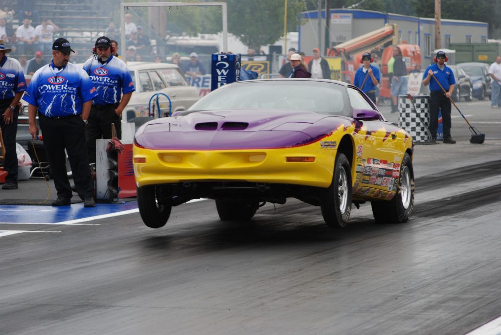 pontiac firebird fourth gen launching at a drag strip