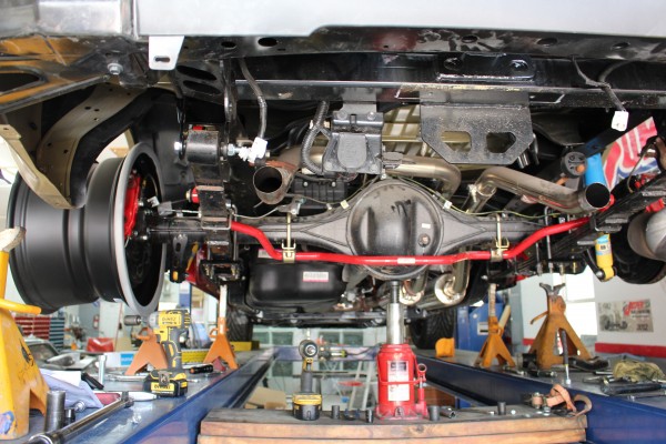 underside of a car on a lift