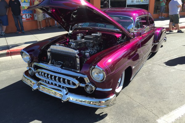 1951 chevy fleetline hot rod parked on street
