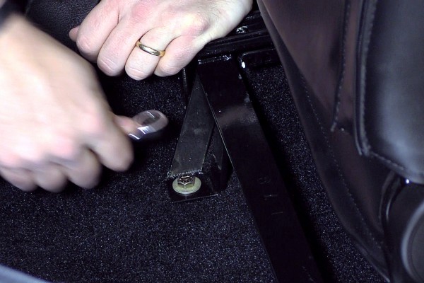 installing a seat bracket in a car