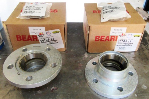 new wheel hub and bearing assemblies on a workbench